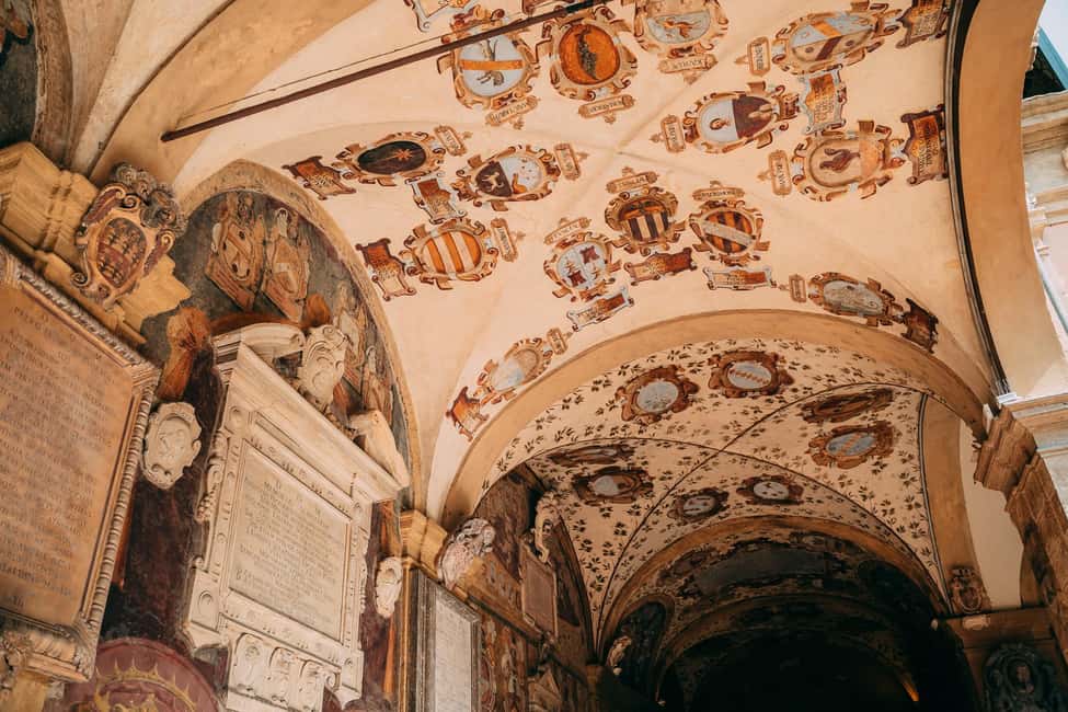 Bologna: Small-Group Tour with the Historic Archiginnasio - Santo Stefano: the seven churches and gallery-walk shortcuts
