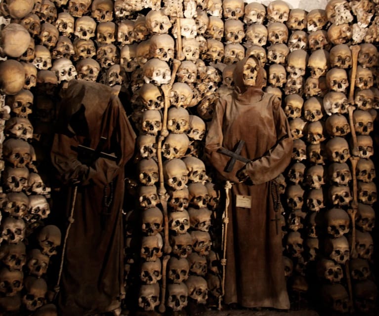 Bone Crypts & S. Clemente ENGLISH tour - tickets included - Caravaggio’s masterpiece: art that lands because of where you see it