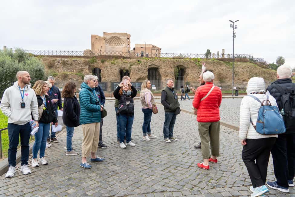 Colosseum Guided Tour: Hotel Transport included - Entering the Colosseum: first and second levels with a guide