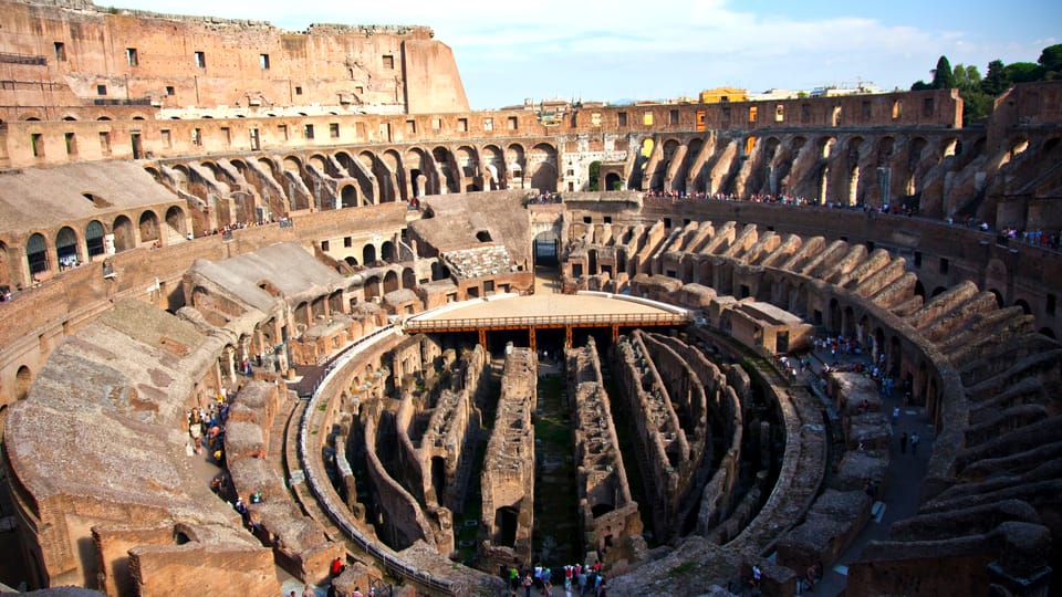 Colosseum with Arena Floor, Palatine Hill & Forum Tour - Entering the Colosseum arena via Gladiator’s Gate