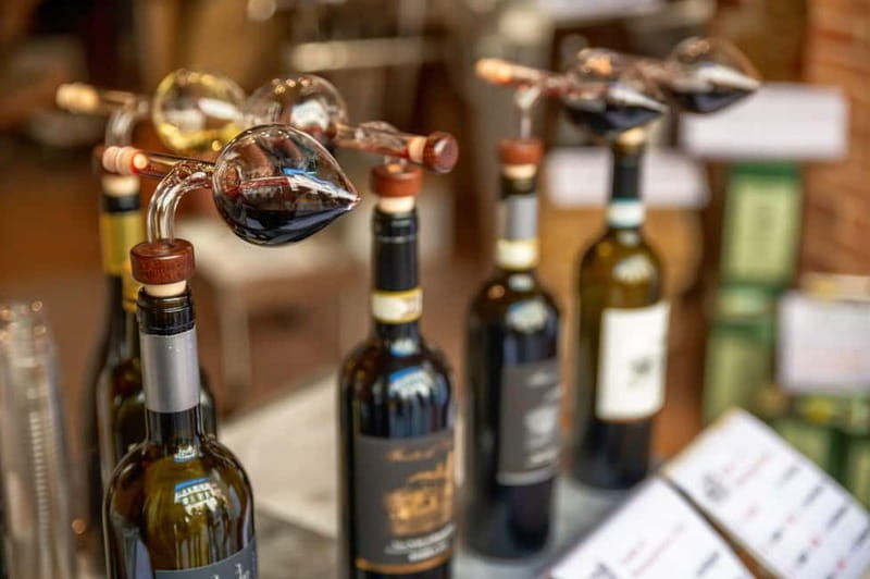 From Roma: Montepulciano and Montalcino, on the Wine Routes - The 13th-century cellar: DOCG tasting, Etruscan history, and lunch that hits