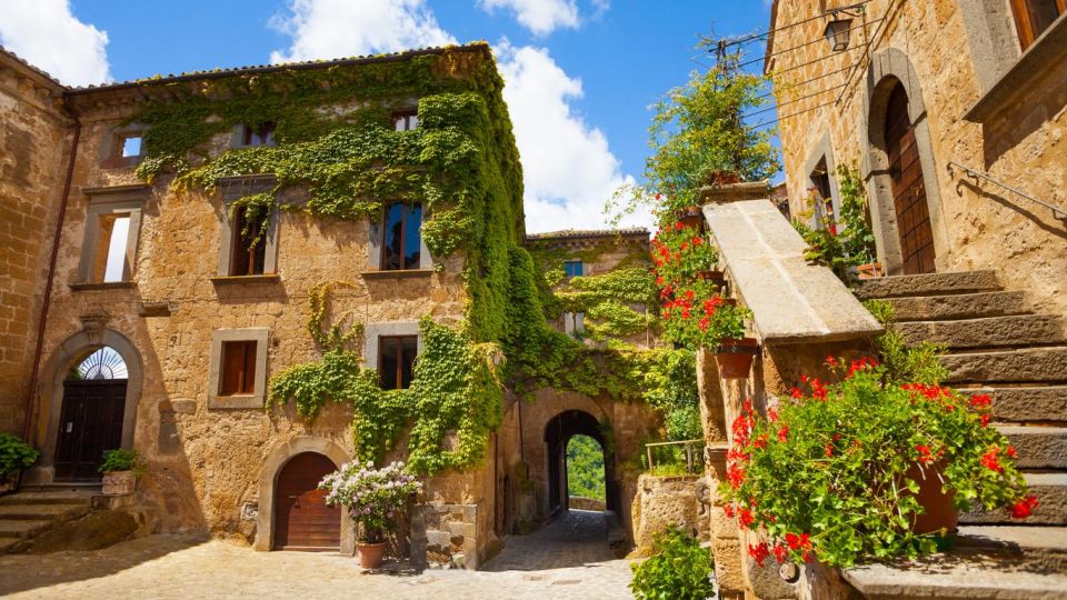 From Rome: Orvieto and Civita di Bagnoregio Private Day Trip - Civita di Bagnoregio: the steep bridge, the views, and the clock