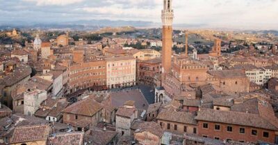 From Rome: Siena & San Gimignano Semiprivate Day Trip - San Gimignano UNESCO: towers, medieval lanes, and Vernaccia tasting