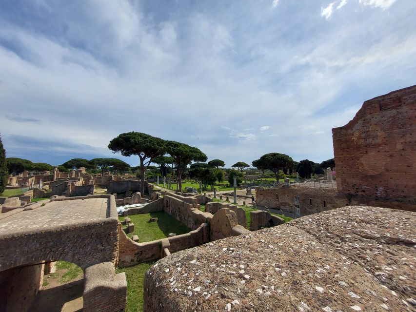 Ostia Antica: Archaeological Guided Private Tour - The Capitolium and Forum Square: where civic life and religion met