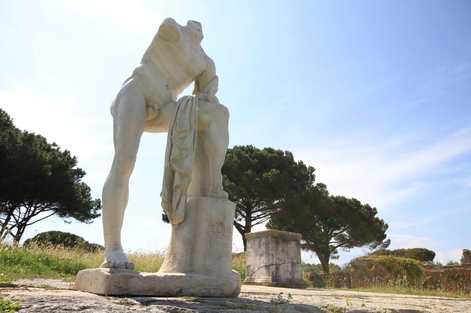 Ostia Antica: Hidden City Guided ENGLISH Tour with Transfer - Meeting at Caffè Piramide: the start that keeps things easy