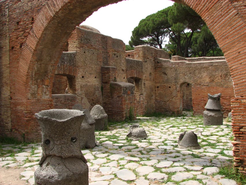 Ostia Antica: Small group tour from Rome - The Square of the Guilds: where business dreams got made