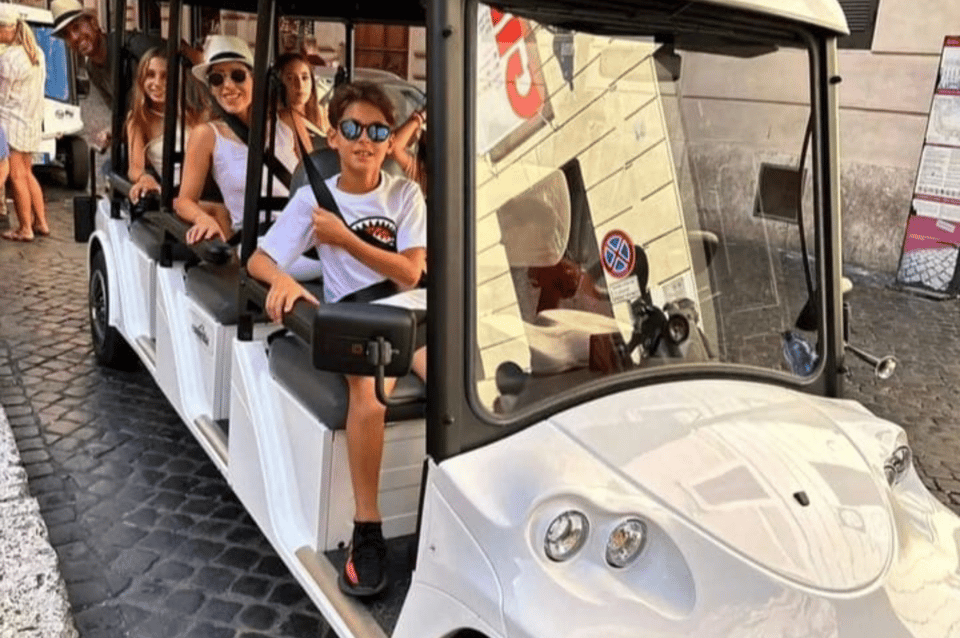 Rome: 3-hour guided city tour by electric golf cart - Aventine Hill, Circus Maximus, and the Colosseum arena-floor photo moment