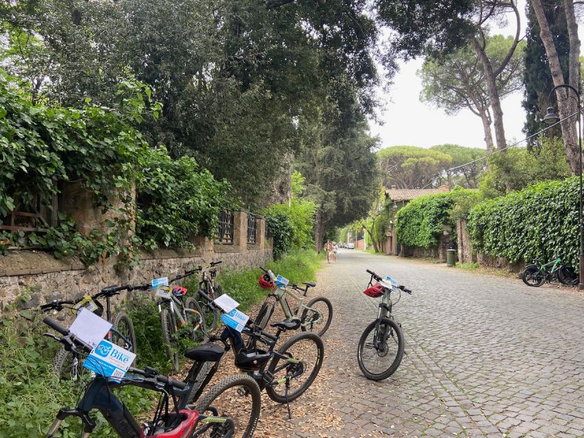 Rome: Appian Way Guided Tour on E-Bike with italian Aperitif - Tomb of Cecilia Metella and Appia Antica Archaeological Park: the road starts to feel real