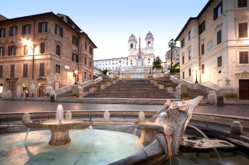 Rome By Night: Small Group E-Bike Tour - Trevi Fountain after dark: photo time with a calmer feel