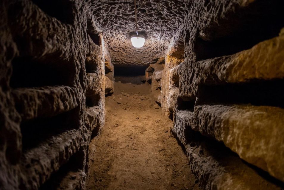 Rome Catacombs Underground Small Guided Tour with Transfer - Walking the Catacombs: Tunnels, Frescoes, and Inscriptions