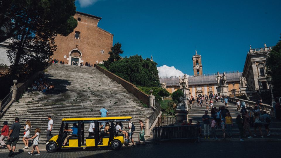 Rome: City Highlights Golf Cart Tour with Local Guide - Piazza Colonna and the Rome you can’t see from one street