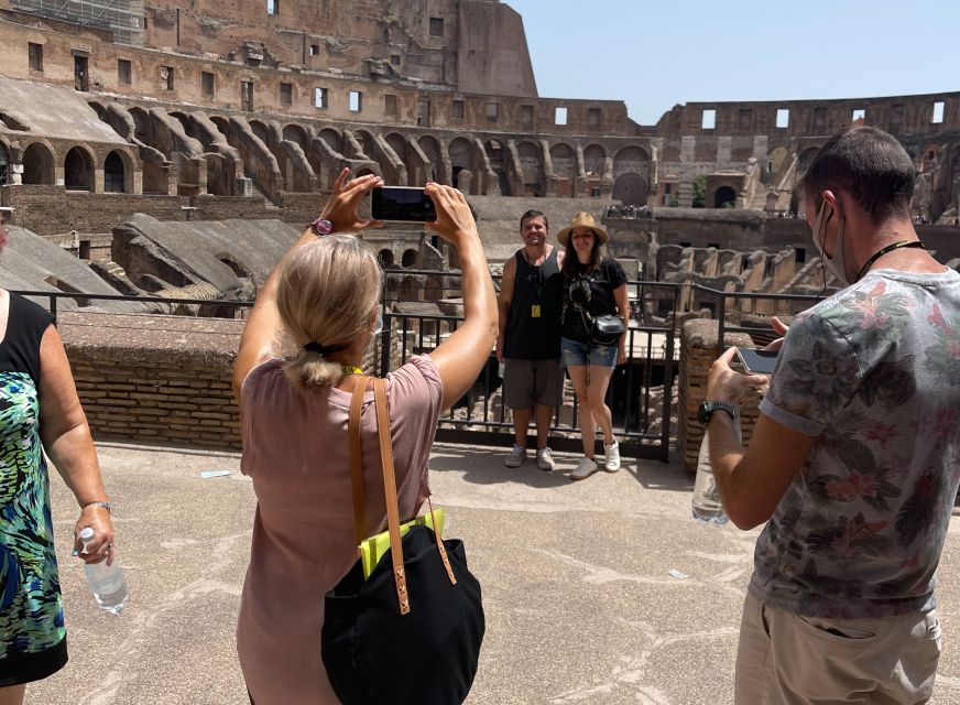 Rome: Colosseum, Arena & Ancient City Guided Tour - Headphones + a Relaxed Group Pace: How the tour helps you enjoy it