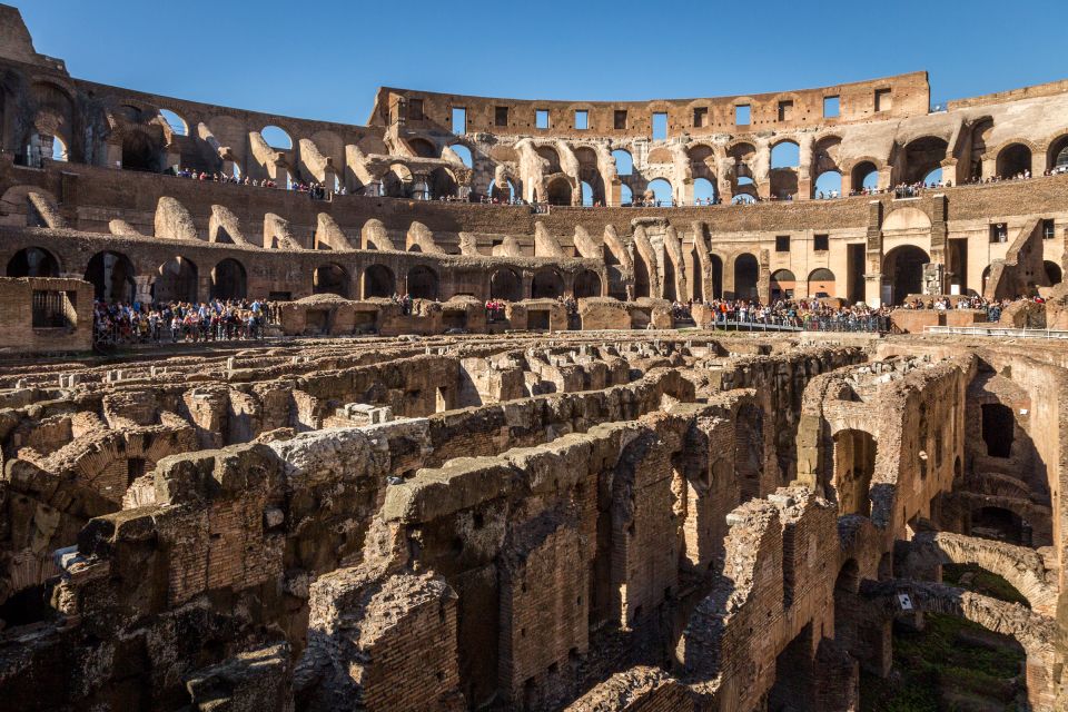 Rome: Colosseum, Forum and Palatine Hill Private Guided Tour - Entering the Colosseum: gladiator energy, guided storytelling, and the arena option