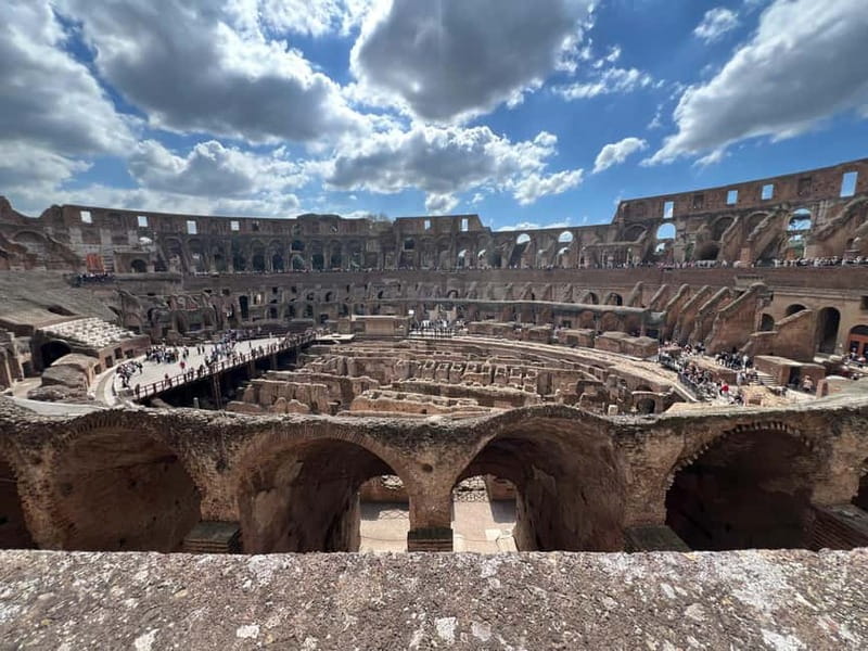 Rome: Colosseum, Roman Forum and Palatine Hill & Audioguide - Entering the Colosseum with pre-purchased access