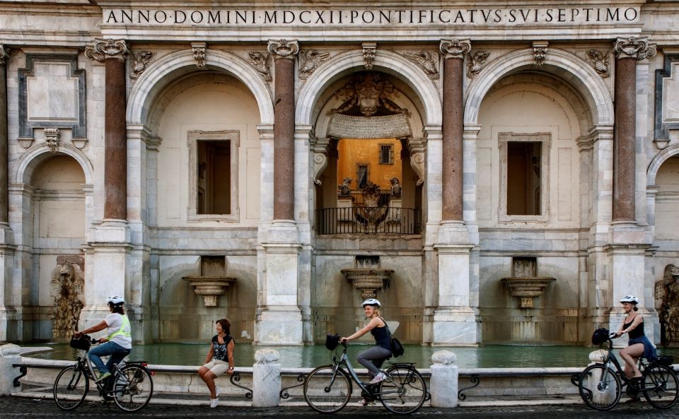 Rome: Private Half-Day Bike Tour with E-bike - The Colosseum stop: seeing scale, not just architecture