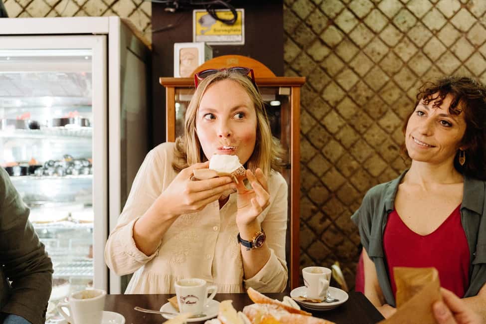 Rome: Testaccio Food & Market Tour with Pasta & Wine - Inside Testaccio Market: cured meats, cheeses, and that famous sandwich vibe